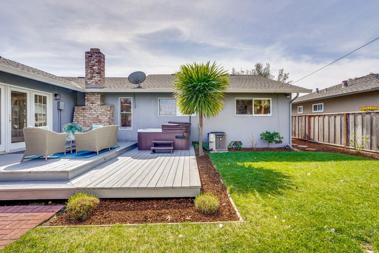 891 Humewick Way Sunnyvale, CA 94087 - Photo 43 of 45 a view of a house with backyard and a sitting area