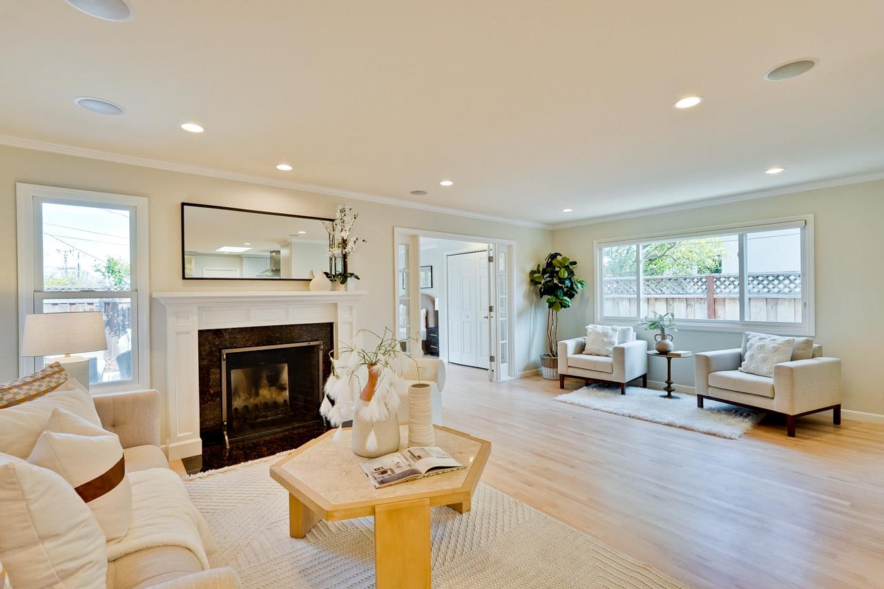 891 Humewick Way Sunnyvale, CA 94087 - Photo 5 of 45 a living room with furniture and a fireplace