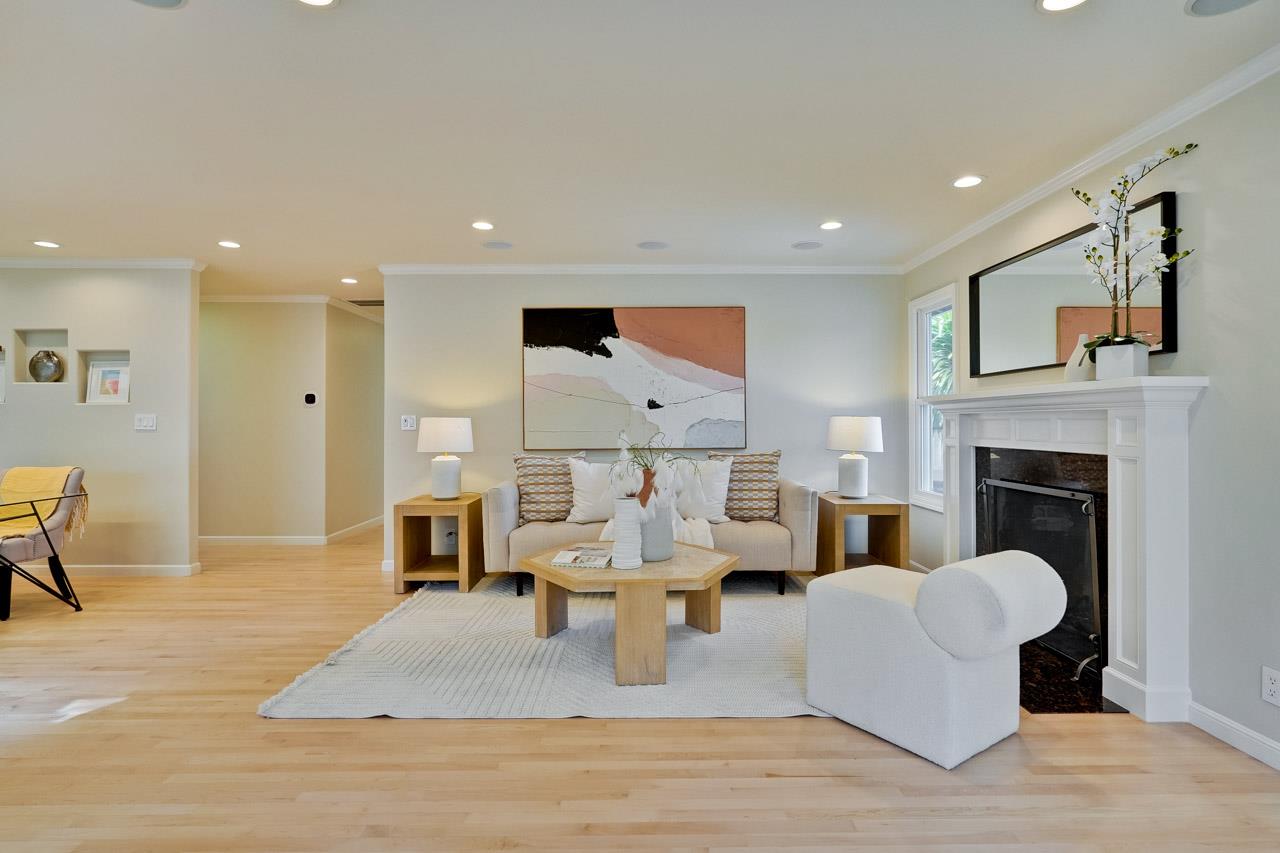 891 Humewick Way Sunnyvale, CA 94087 - Photo 7 of 45 a living room with furniture and a fireplace