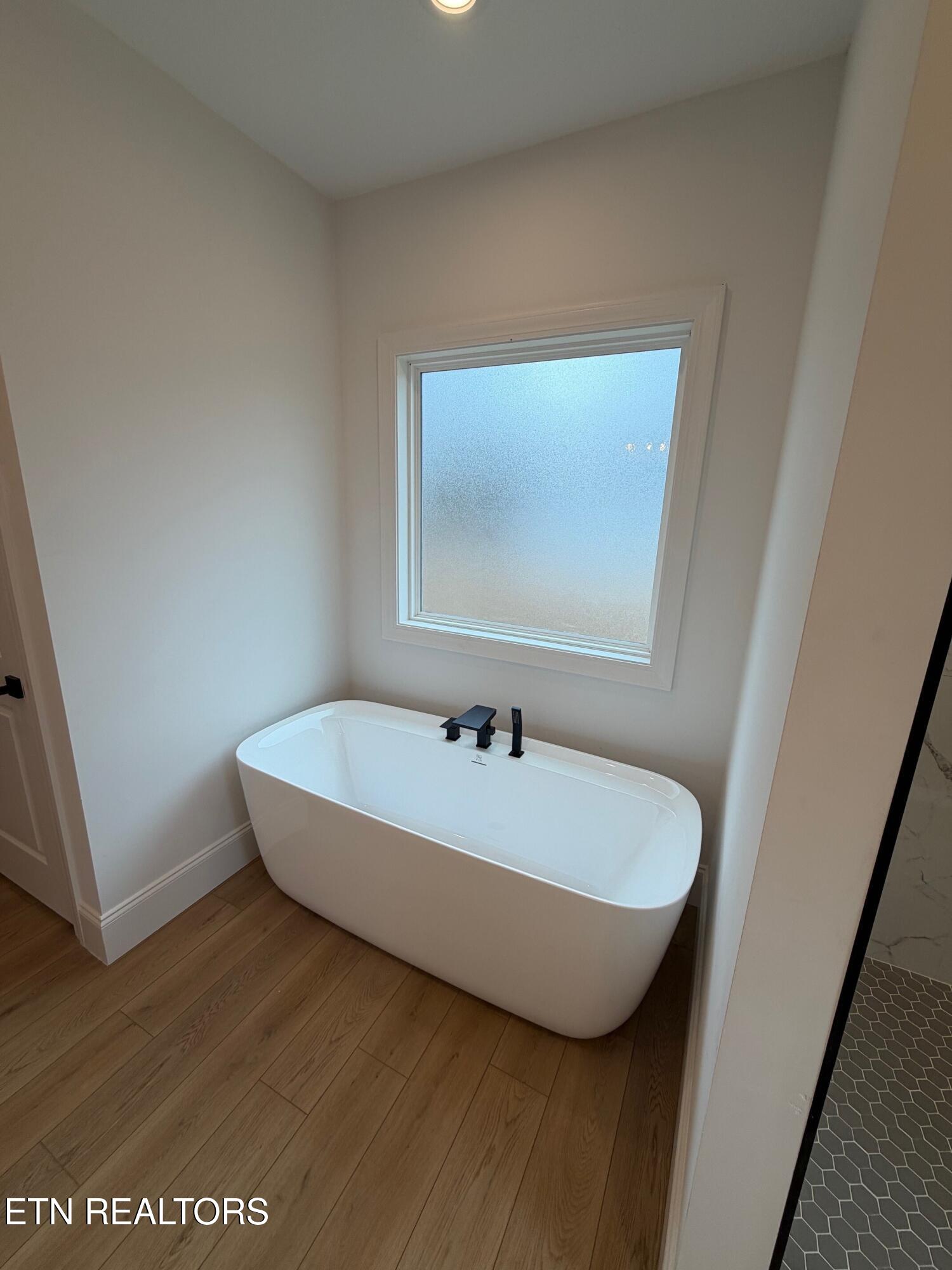 6813 Flint Gap Road Knoxville, TN 37914 - Photo 25 of 45 Free Standing Tub (Master Bathroom)