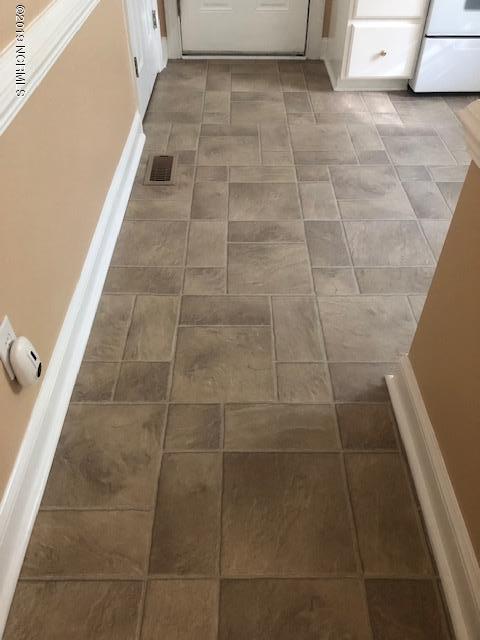 3812 Pecan Grove Road Zebulon, NC 27597 - Photo 10 of 21 Tile flooring in the kitchen