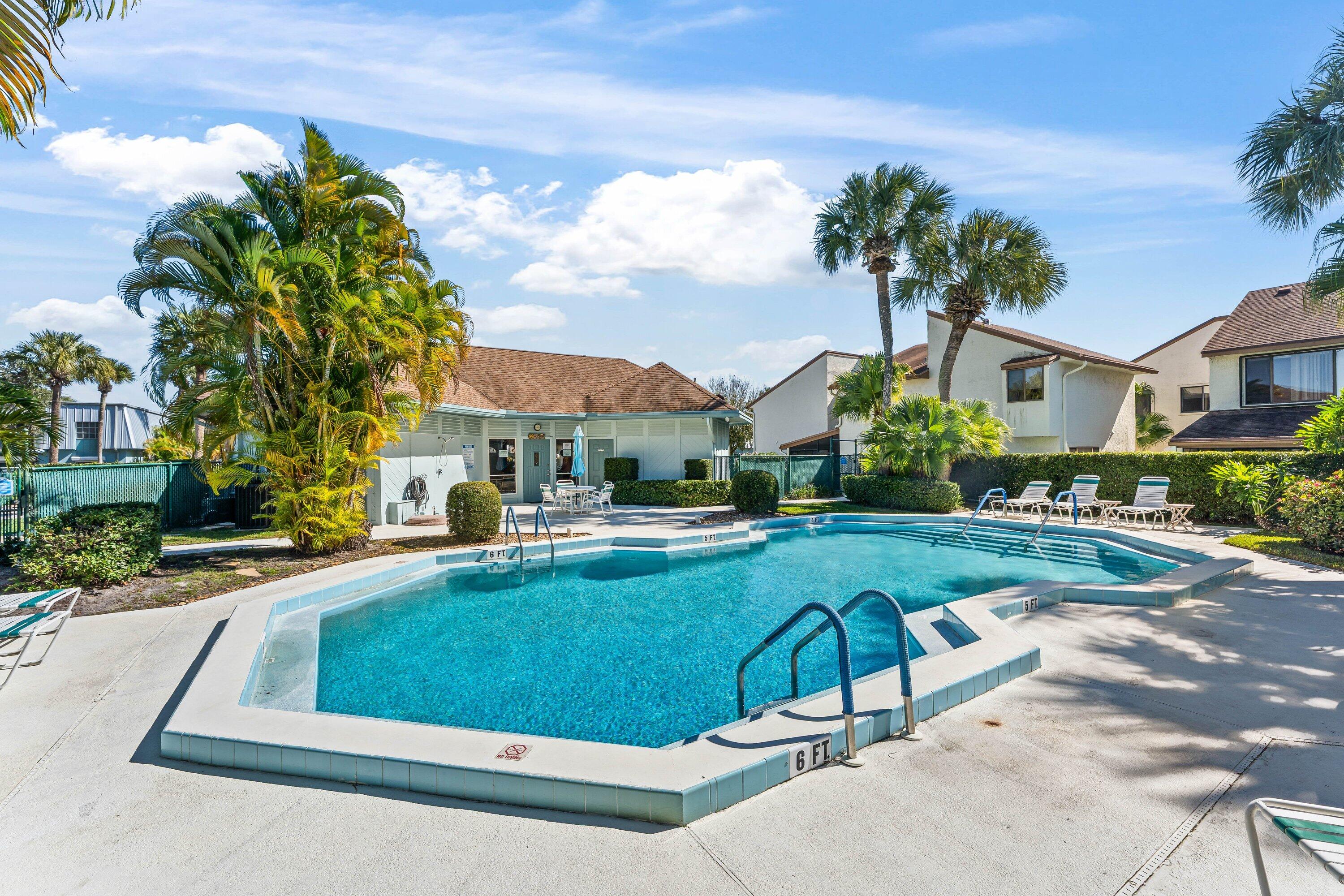 950 South Kanner Highway, Unit C10 Stuart, FL 34994 - Photo 31 of 31 a view of a house with swimming pool and sitting area