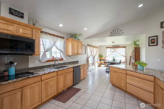 a large kitchen with cabinets