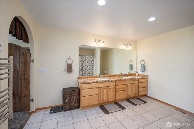 a room with a table and chairs