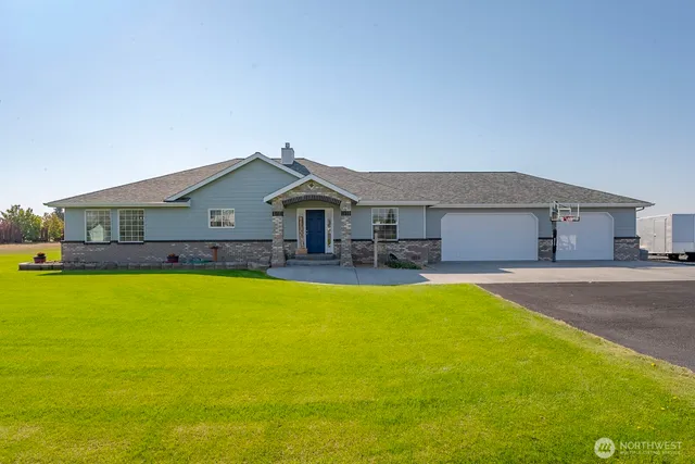 a front view of a house with swimming pool