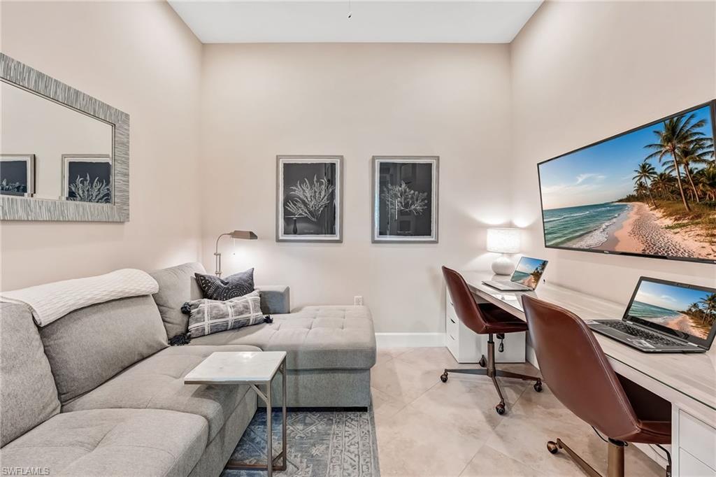 7002 Dominica Drive Naples, FL 34113 - Photo 34 of 45 Office with built in study area and baseboards