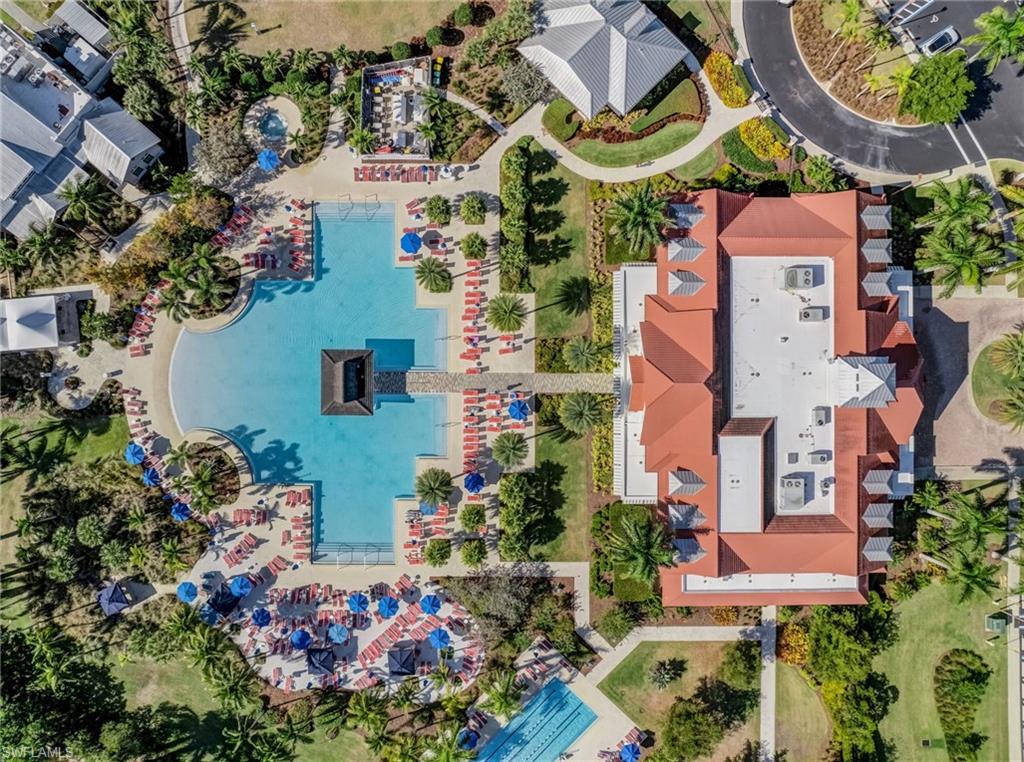 7002 Dominica Drive Naples, FL 34113 - Photo 40 of 45 Drone / aerial view of a pool