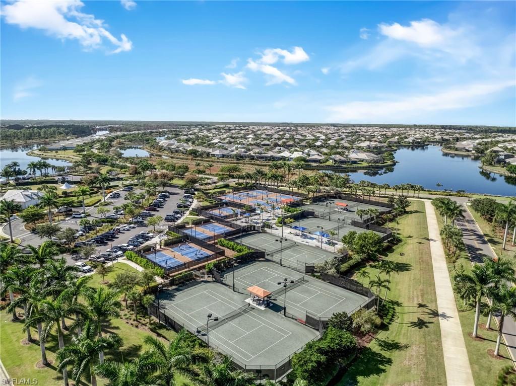 7002 Dominica Drive Naples, FL 34113 - Photo 42 of 45 Drone / aerial view of a large body of water