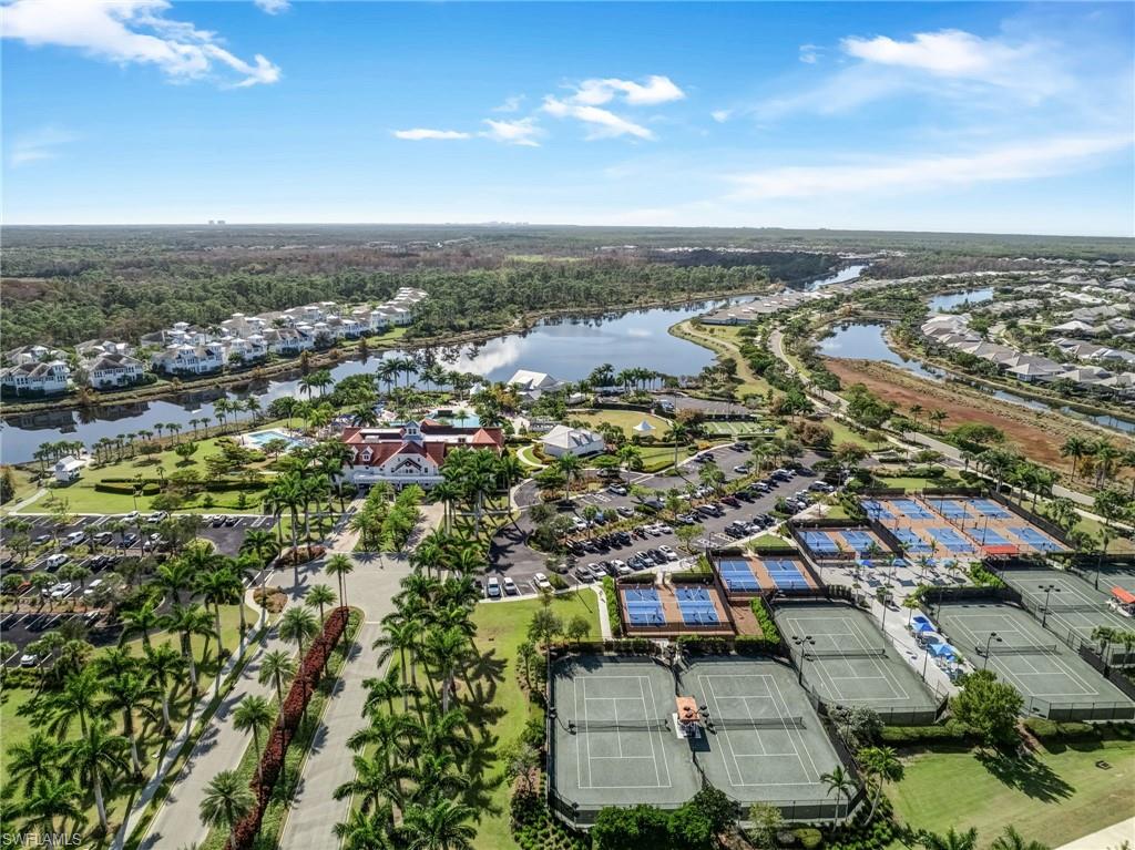 7002 Dominica Drive Naples, FL 34113 - Photo 43 of 45 Aerial view of residential area featuring a nearby body of water