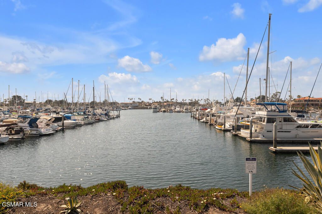 2901 Peninsula Road, Unit 137 Oxnard, CA 93035 - Photo 23 of 35 a view of a lake with boats next to a bridge