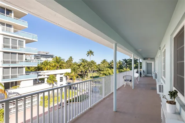 a view of a porch with chairs