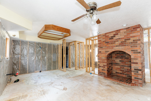 342 East 600 North Logan, UT 84321 - Photo 9 of 23 Interior space undergoing renovation, featuring exposed wood framing and insulation