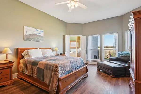 a bedroom with a bed and a couch