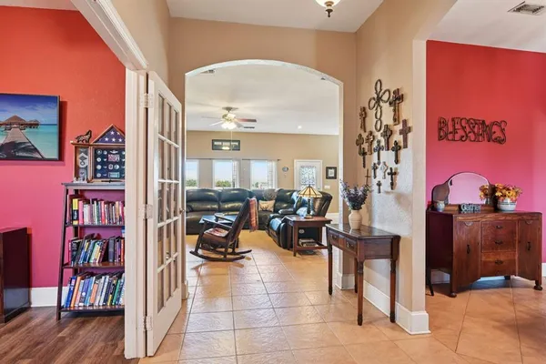 a large kitchen with stainless steel appliances granite countertop a stove and a refrigerator