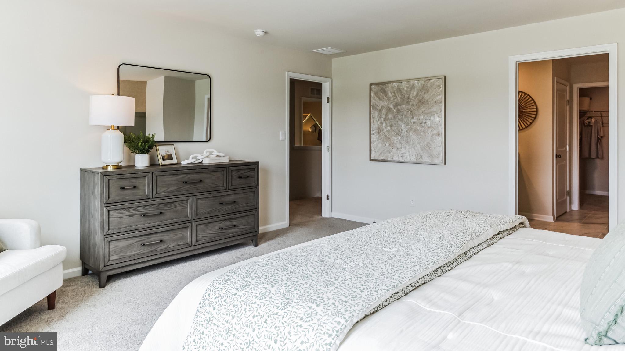 109 Winding Road Easton, PA 18040 - Photo 14 of 26 a bedroom with a bed and a dresser