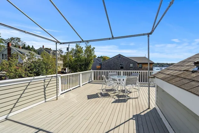 a view of a house with a bench