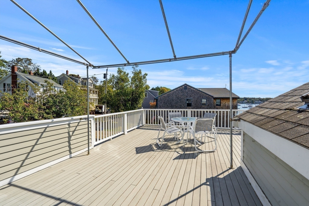 60 Gregory Street, Unit 3 Marblehead, MA 01945 - Photo 31 of 42 a view of balcony with furniture