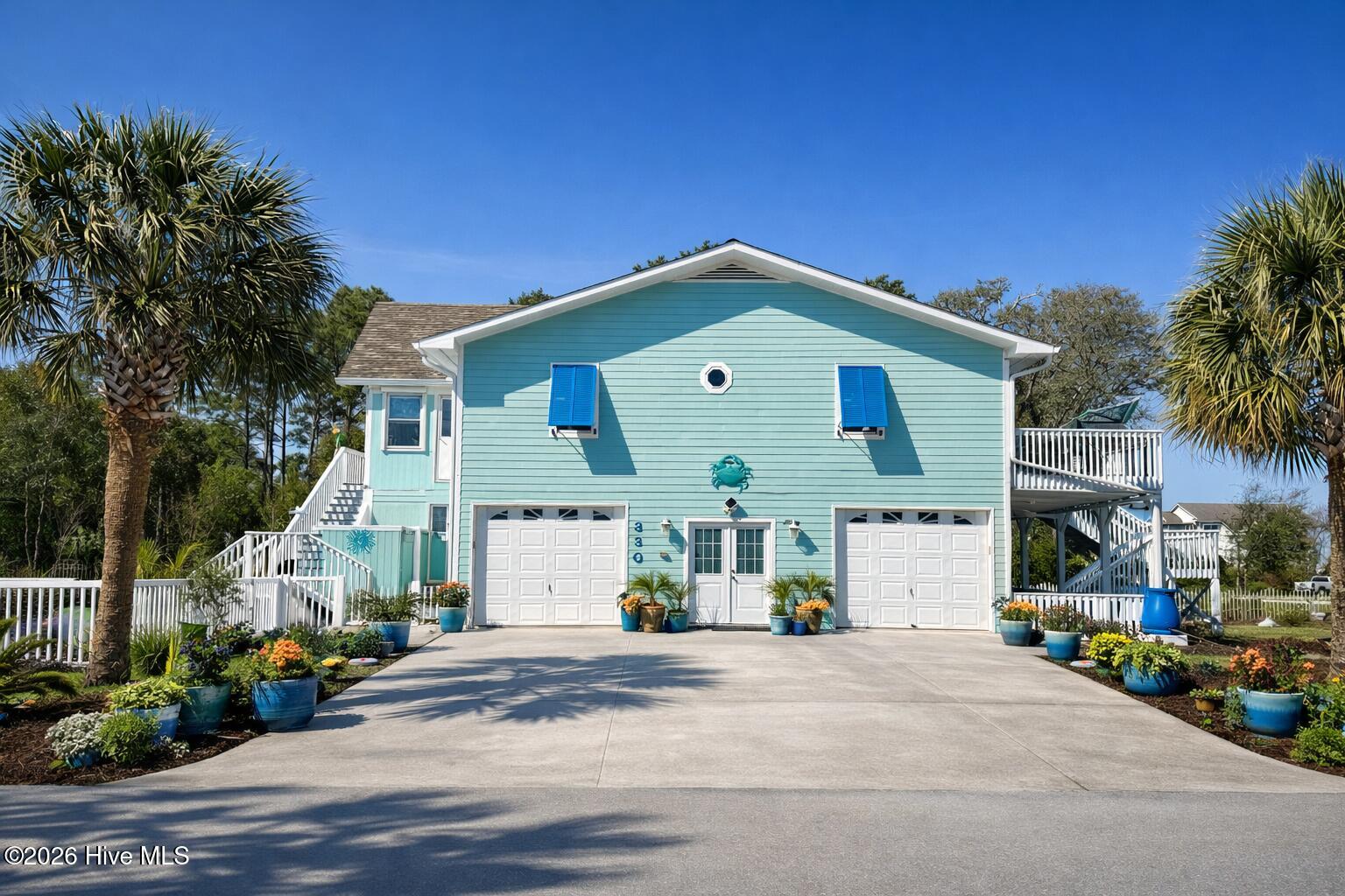 330 Cape Lookout Loop Emerald Isle, NC 28594 - Photo 6 of 80 Garage side entry