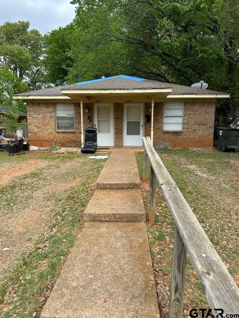 1001 West Queen Street Tyler, TX 75702 - Photo 1 of 4 front view of a house with a yard