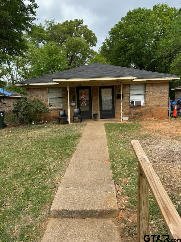 1001 West Queen Street Tyler, TX 75702 - Photo 2 of 4 front view of a house with a patio