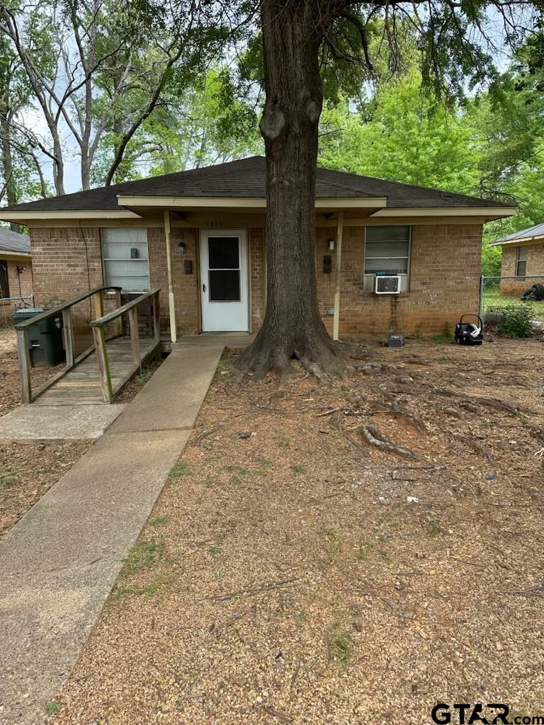 1001 West Queen Street Tyler, TX 75702 - Photo 3 of 4 front view of a house with a yard