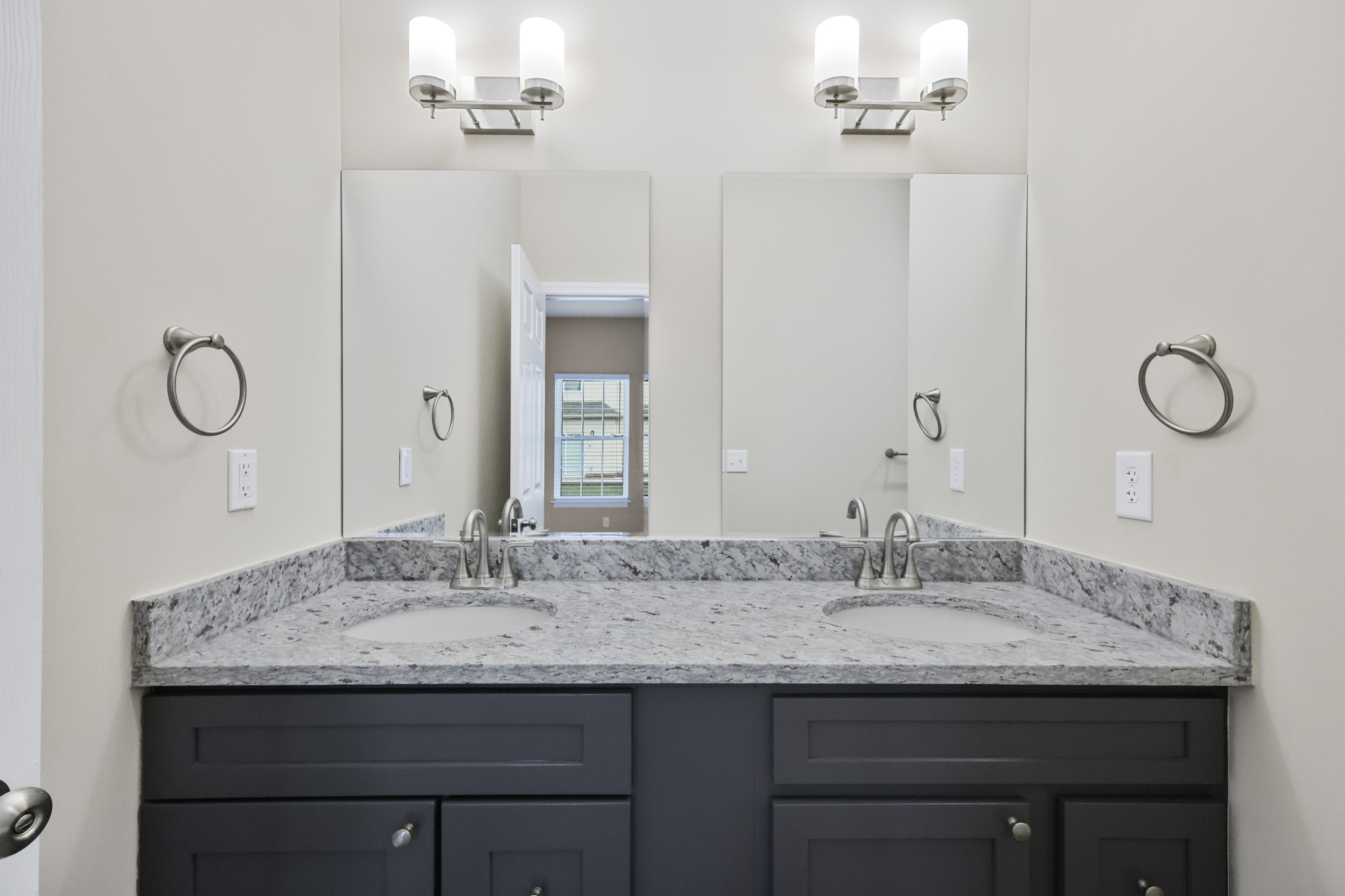 871 Blessing Way Gallatin, TN 37066 - Photo 13 of 25 a bathroom with a granite countertop sink and a mirror