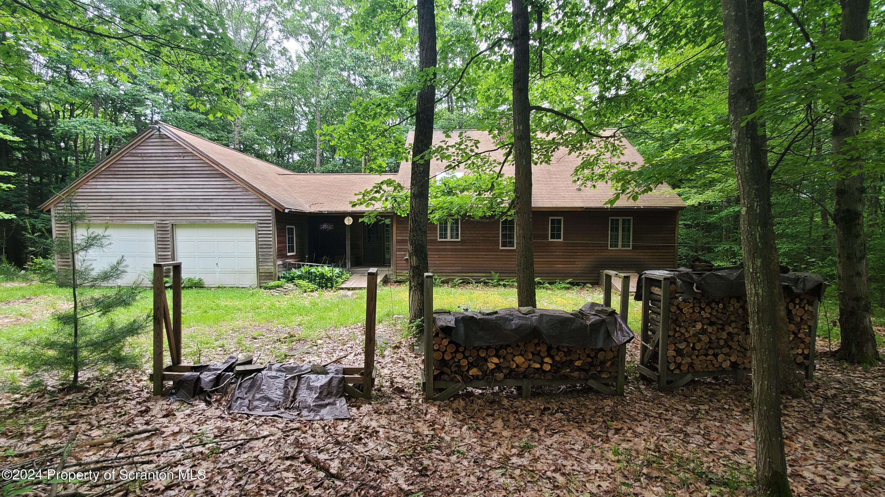 1508 Graham Holw Road Hallstead, PA 18822 - Photo 2 of 32 a view of house with backyard and a garden