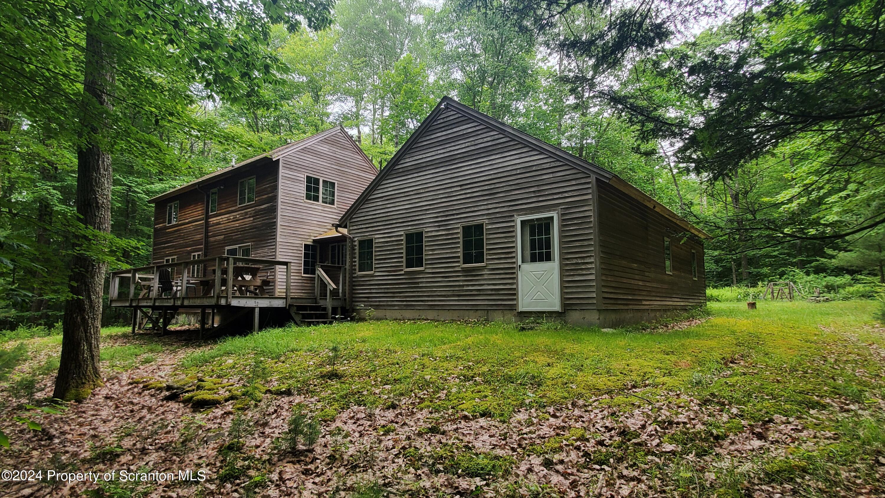 1508 Graham Holw Road Hallstead, PA 18822 - Photo 6 of 32 a view of a house with a yard and a large tree