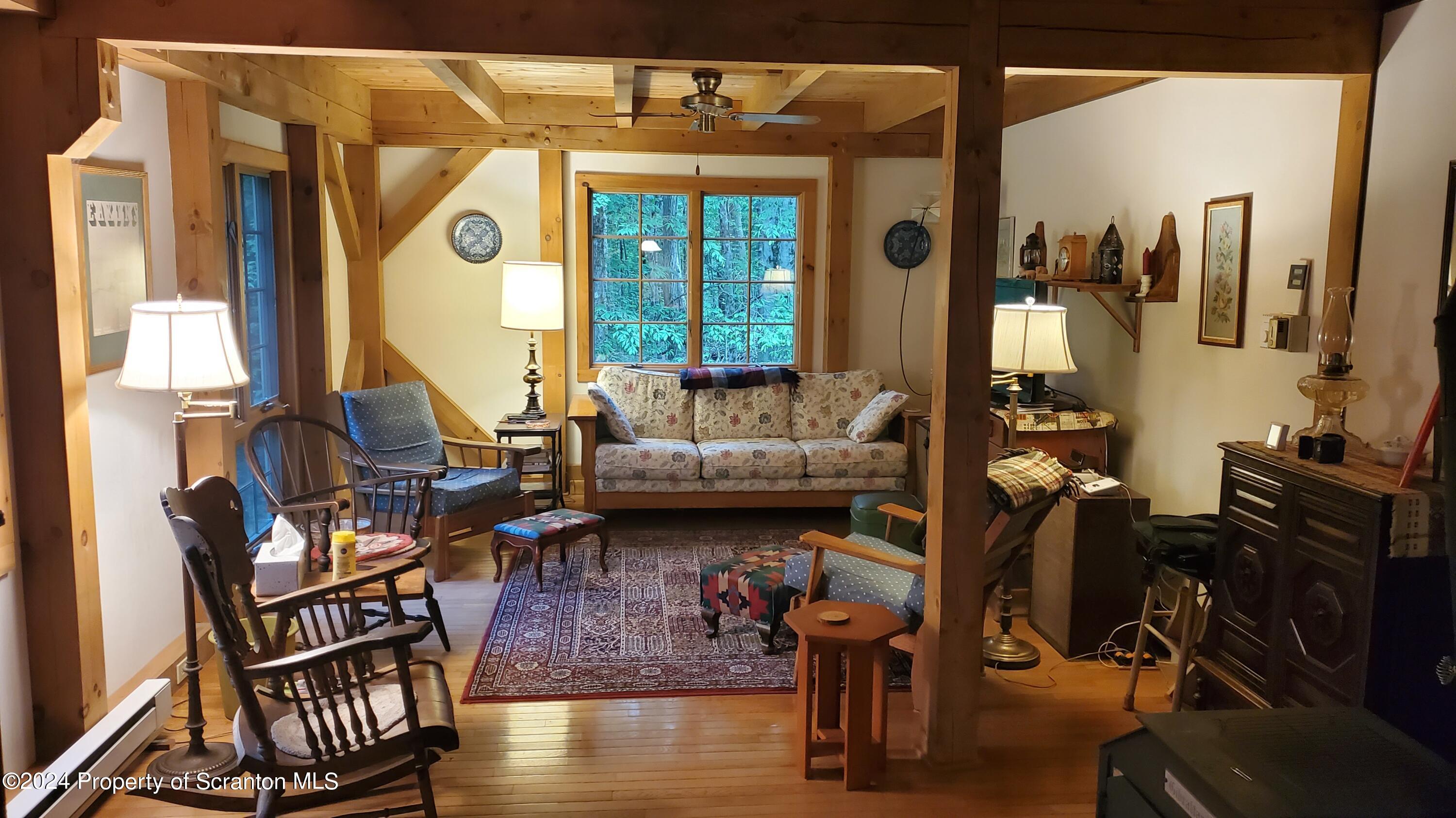 1508 Graham Holw Road Hallstead, PA 18822 - Photo 8 of 32 a living room with furniture and a large window