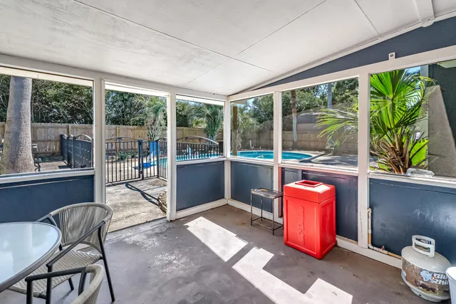 a view of a backyard with plants