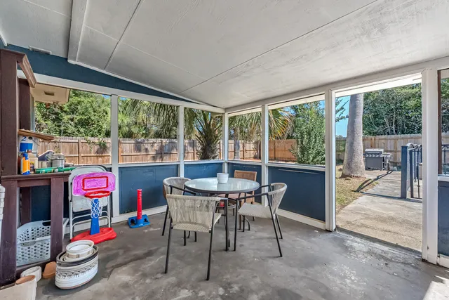 a view of swimming pool with outdoor seating and yard