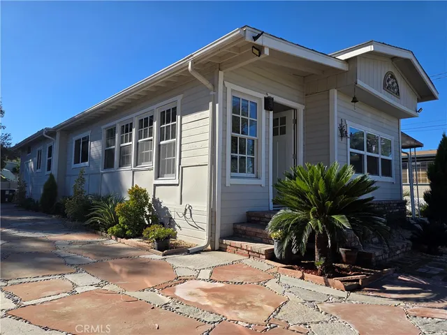 a front view of house with yard