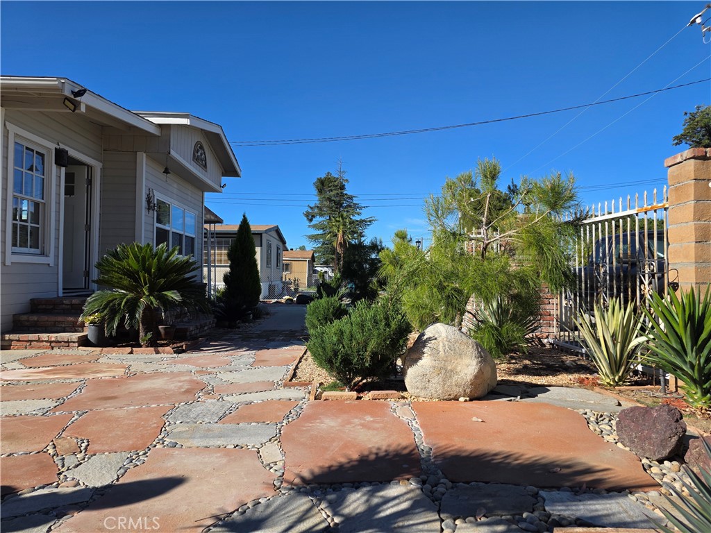 45371 Cardiff Street Hemet, CA 92544 - Photo 14 of 14 a view of a chairs and table in backyard