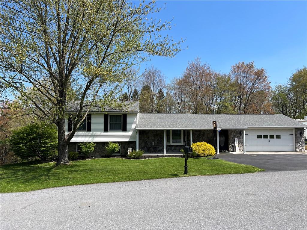 149 North View Heights Road New Florence, PA 15944 - Photo 1 of 31 a front view of house with yard and green space