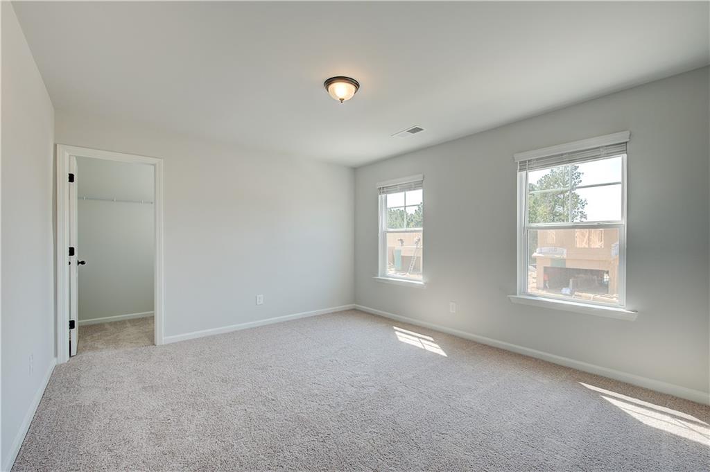 119 St Anne's Place Covington, GA 30016 - Photo 20 of 30 a view of a livingroom with a window