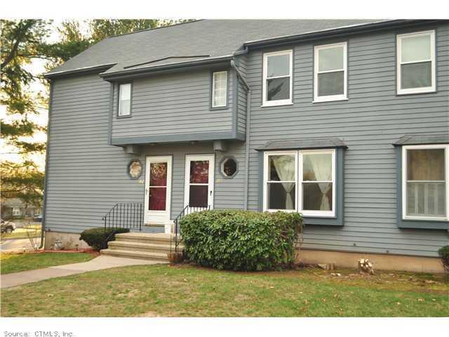 1 Abbott Road, Unit 72 Ellington, CT 06029 - Photo 1 of 1 a view of front of a house with a yard