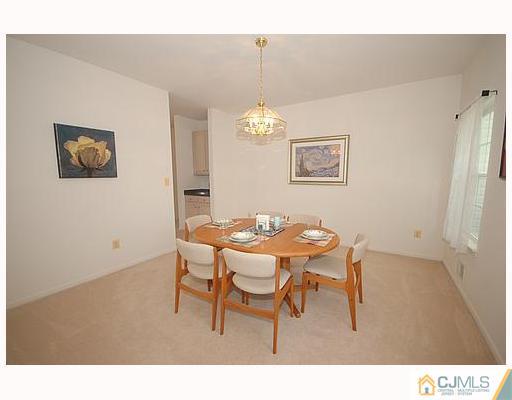 21 Maher Road Somerset, NJ 08873 - Photo 3 of 8 a dining room with furniture and window