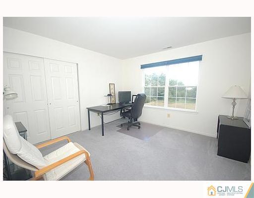 21 Maher Road Somerset, NJ 08873 - Photo 5 of 8 a living room with furniture and a window