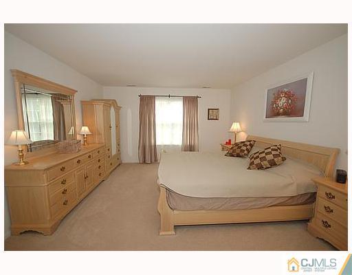 21 Maher Road Somerset, NJ 08873 - Photo 8 of 8 a bedroom with bed and window