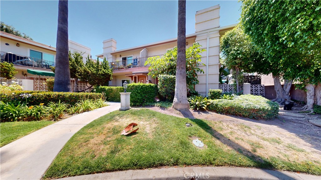 1354 Shadow Lane Fullerton, CA 92831 - Photo 11 of 65 a view of a garden with a building in the background