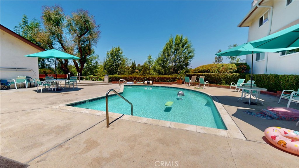 1354 Shadow Lane Fullerton, CA 92831 - Photo 15 of 65 a view of a swimming pool with a patio