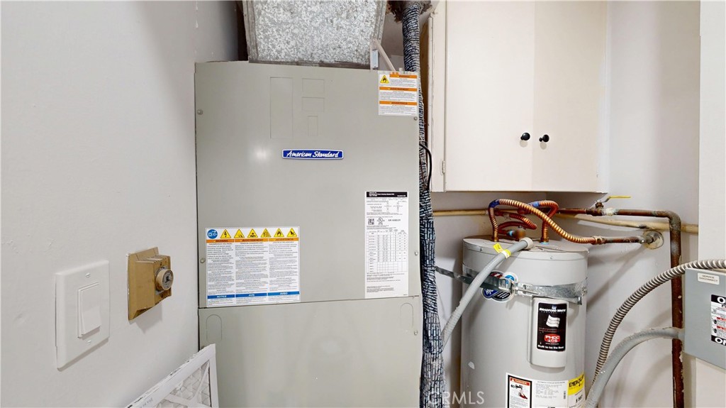 1354 Shadow Lane Fullerton, CA 92831 - Photo 22 of 65 a view of storage and utility room with washer and dryer