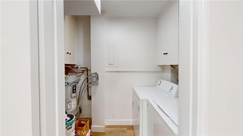 1354 Shadow Lane Fullerton, CA 92831 - Photo 23 of 65 a view of a storage & utility room with a washer and dryer