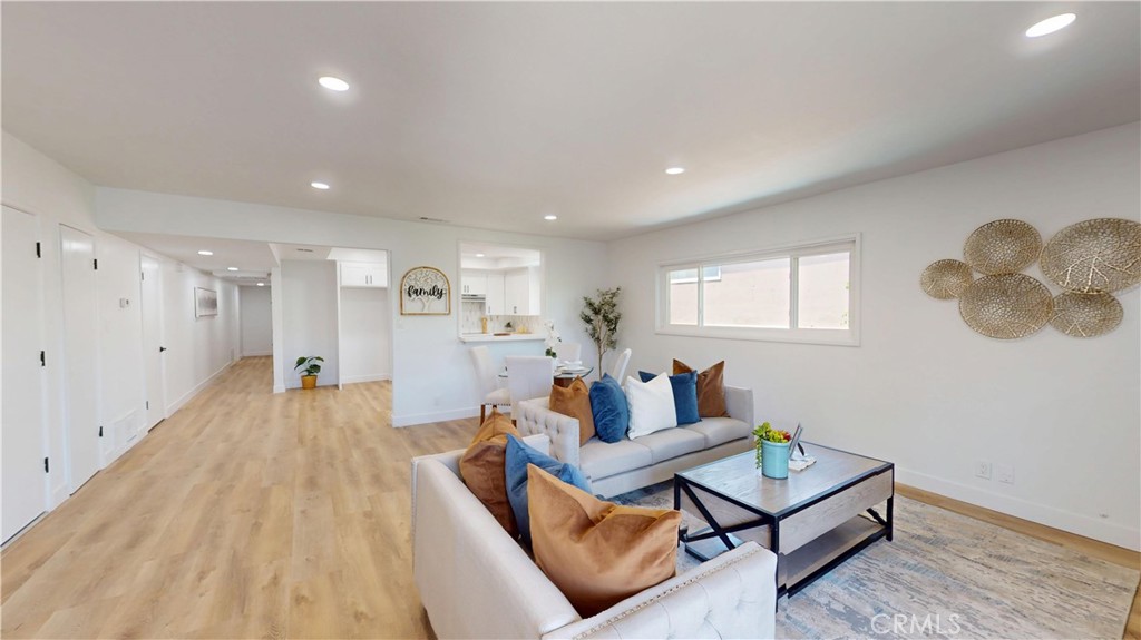 1354 Shadow Lane Fullerton, CA 92831 - Photo 33 of 65 a living room with furniture and a wooden floor