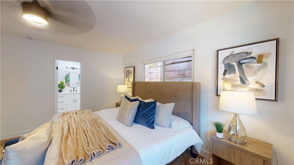 1354 Shadow Lane Fullerton, CA 92831 - Photo 39 of 65 a bedroom with a bed and painting on the wall