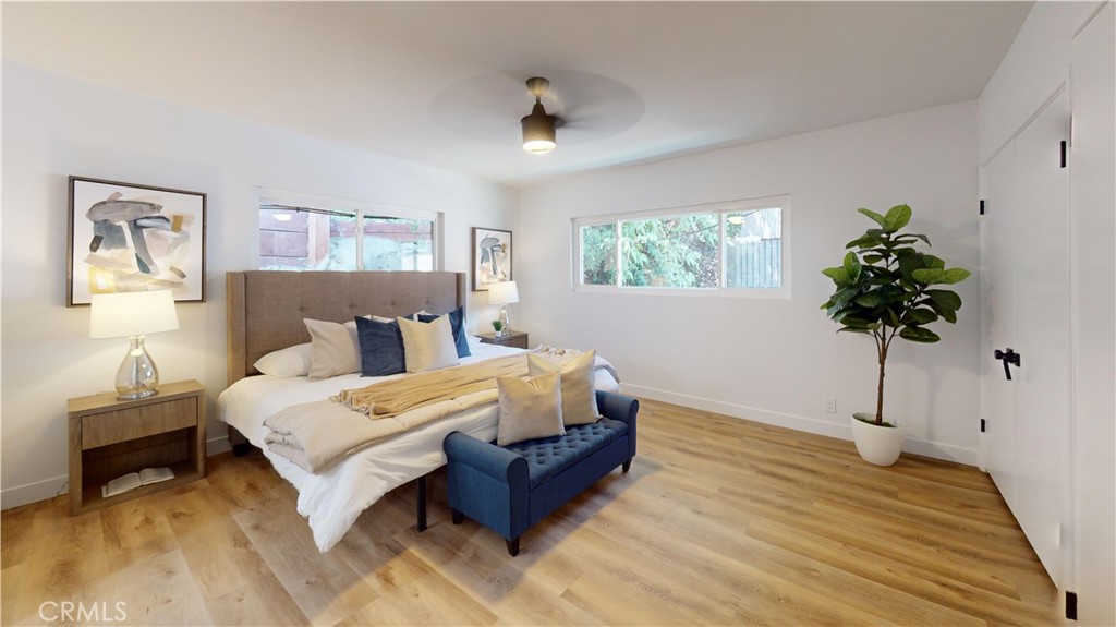 1354 Shadow Lane Fullerton, CA 92831 - Photo 55 of 65 a bedroom with a bed and a potted plant