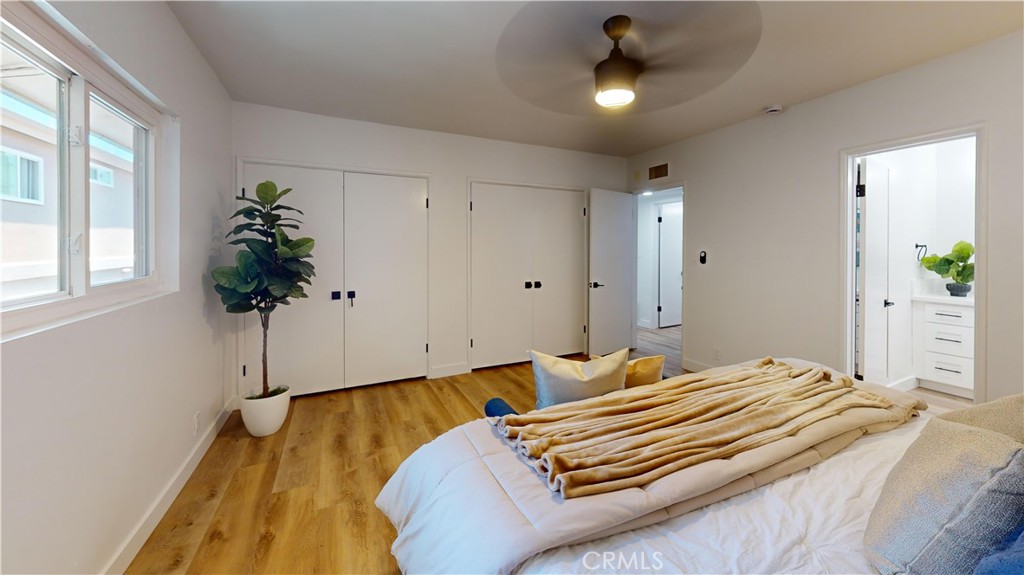 1354 Shadow Lane Fullerton, CA 92831 - Photo 57 of 65 a bedroom with bed and a potted plant