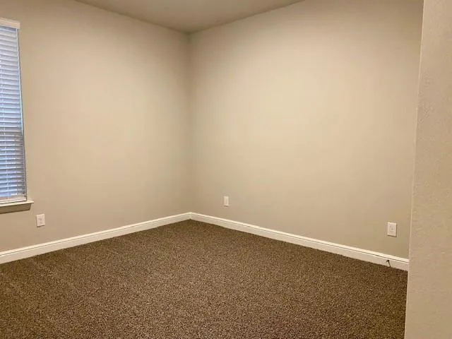 an empty room with a window