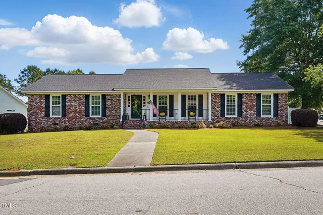 a view of a house with a swimming pool