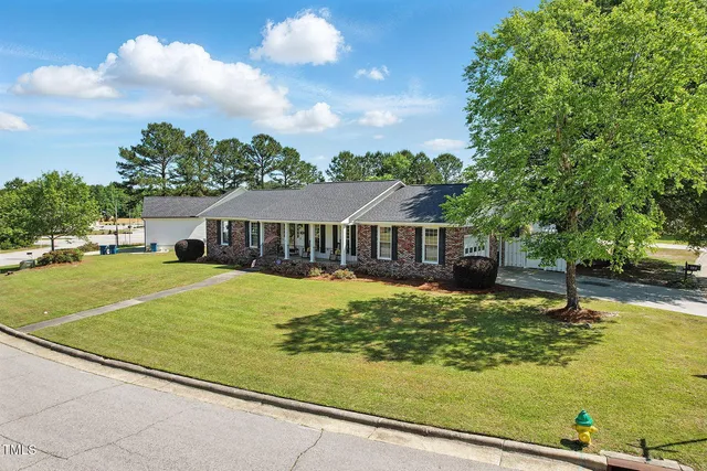 a view of a house with swimming pool